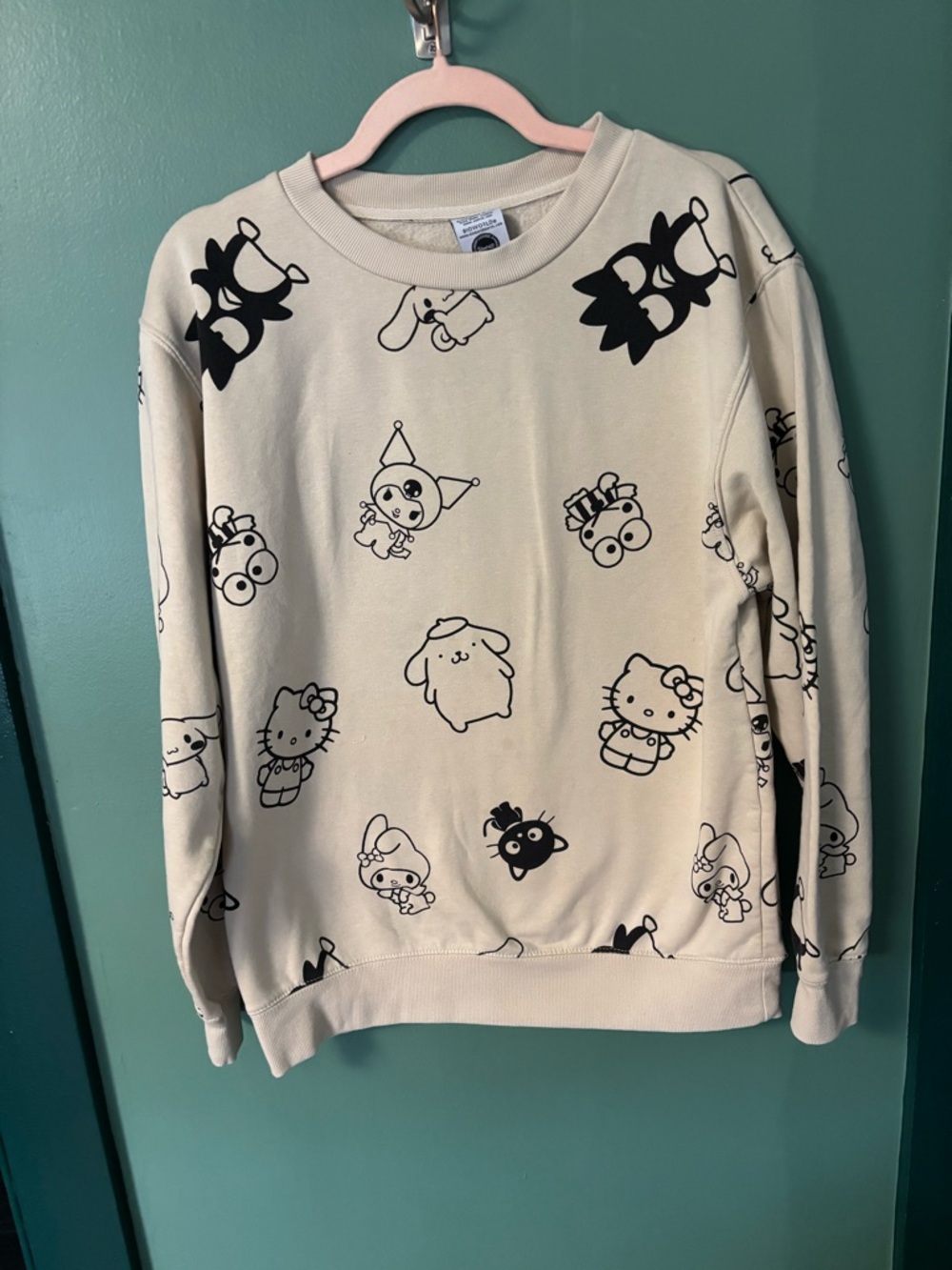 Bioworld Cream Crewneck Sweater with Black Sanrio Character Print